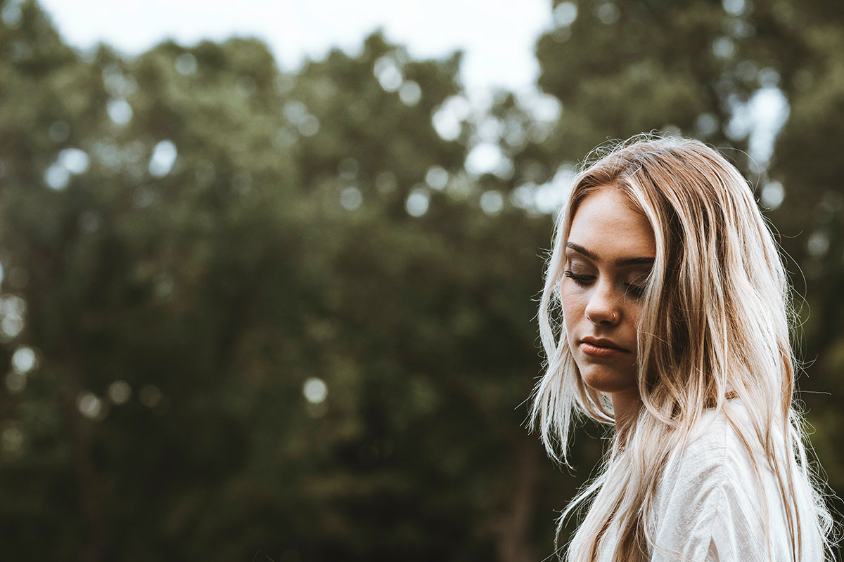 A woman considering the mental effects of abortion